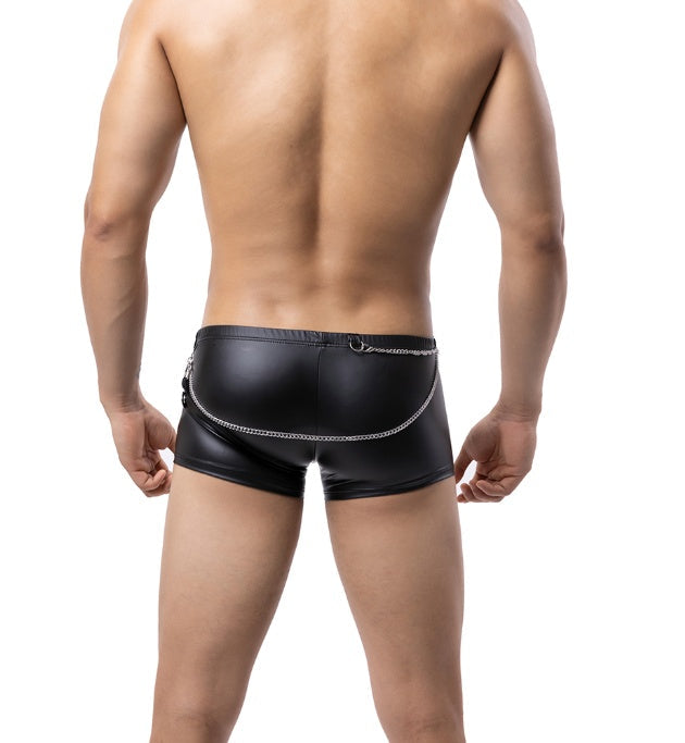 Black pleather cheeky boxer shorts back view on male model.