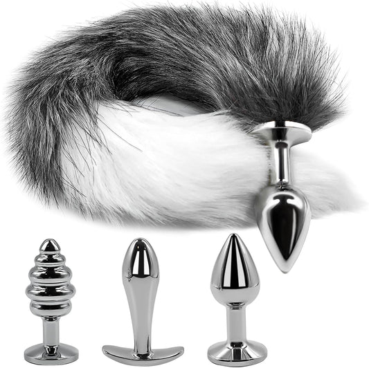 Gray and white fox tail butt plug with three silver metal anal plugs in small medium and large sizes product flat lay.